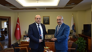 REKTÖR DEVECİ, ÖDÜLLÜ FARMAKOLOG YRD. DOÇ. DR. A. HAKAN KURT’U MAKAMINDA KABUL ETTİ