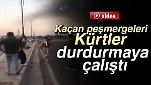Kaçan peşmergeleri Kürtler durdurmaya çalıştı