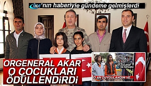 Org. Akar, bayrak öperken görüntülenen 2 kuzeni ödüllendirdi