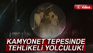 Yük sınırını aşan kamyonet tepesinde tehlikeli yolculuk