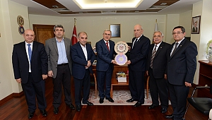 TİCARET BORSASI YÖNETİM KURULU ÜYELERİ, REKTÖR CAN’I ZİYARET ETTİ