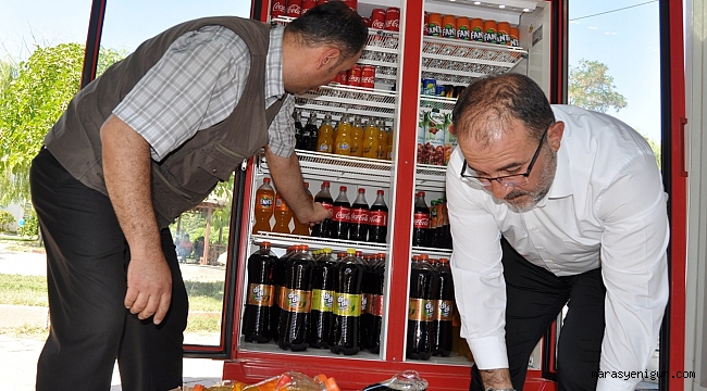 BAŞKAN GÜVEN DOLAPLARI KENDİ ELLERİYLE BOŞALTTI