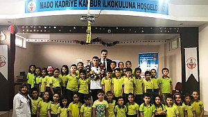 MİLLİ YÜZÜCÜ EROĞLU ÖĞRENCİLERLE BULUŞTU