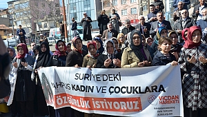 ESİR KADINLAR İÇİN BİLEKLERİNİ EŞARPLA BAĞLADILAR 