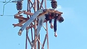 Tırmandığı elektrik direğinde akıma kapıldı