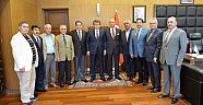 SAĞLAM’DAN ERKOÇ’A HAYIRLI OLSUN ZİYARETİ